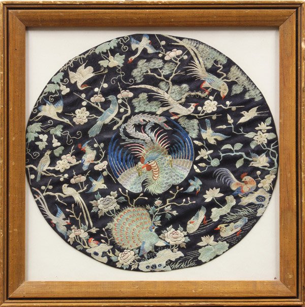 Two Chinese Embroidered Roundels: (Lot of 2) Framed Chinese embroidered medallions, the first featuring a gilt couched meandering dragon amid satin stitched Buddhist Treasures among blue cloud scrolls; the second, embroidered with the
