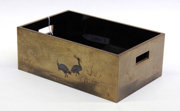 Japanese Maki-e Lacquer Haizara (Smoking Box), 19t: Japanese gilt lacquer decorated haizara (smoking box), 19th century, decorated on the exterior sides with herons feeding in stream scattered with reeds, executed in silver and gold hiramakie, takamaki