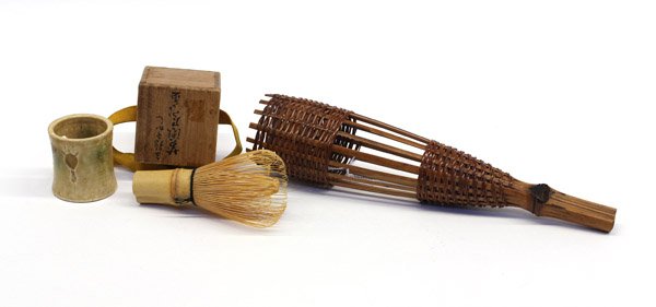 Four Japanese Tea Ceremony Items: (Lot of 4) Japanese tea ceremony items: a cylindrical Kiseto kettle lid rest pierced with three abstract birds, with inscribed tomobako, 2''h; a bamboo tea whisk, 4.5''l; a bamboo tea scoop, 7.125''l;
