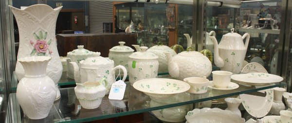 Collection of Belleek Tableware: (lot of 28) Collection of Belleek tableware mostly in the ''Clover'' pattern, including vases, teapots, jardiniere, plates, etc., marks including sixth mark, seventh mark and collectors society, talle