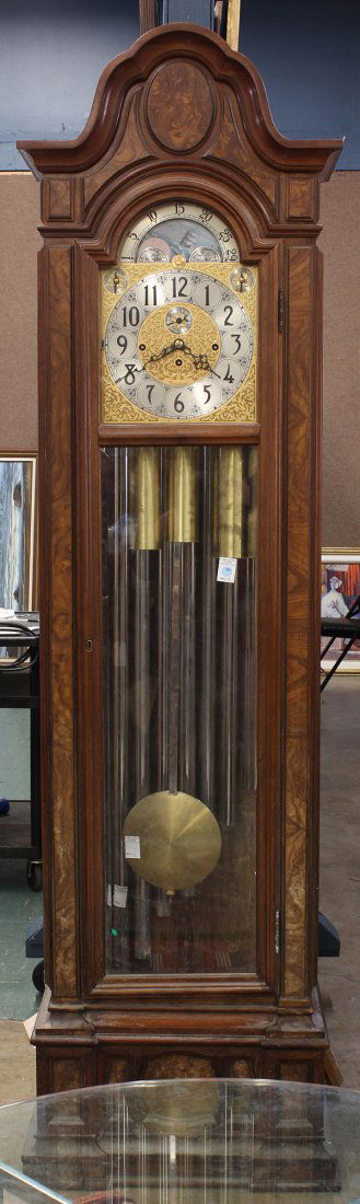 Victorian Style Tall Case Clock: Victorian style walnut tall case clock by Herschede, model 230, ''Sheffield'' having raised burl panels, flanking the single door case, opening to the nine tube movement, fronting a chaised dial havin