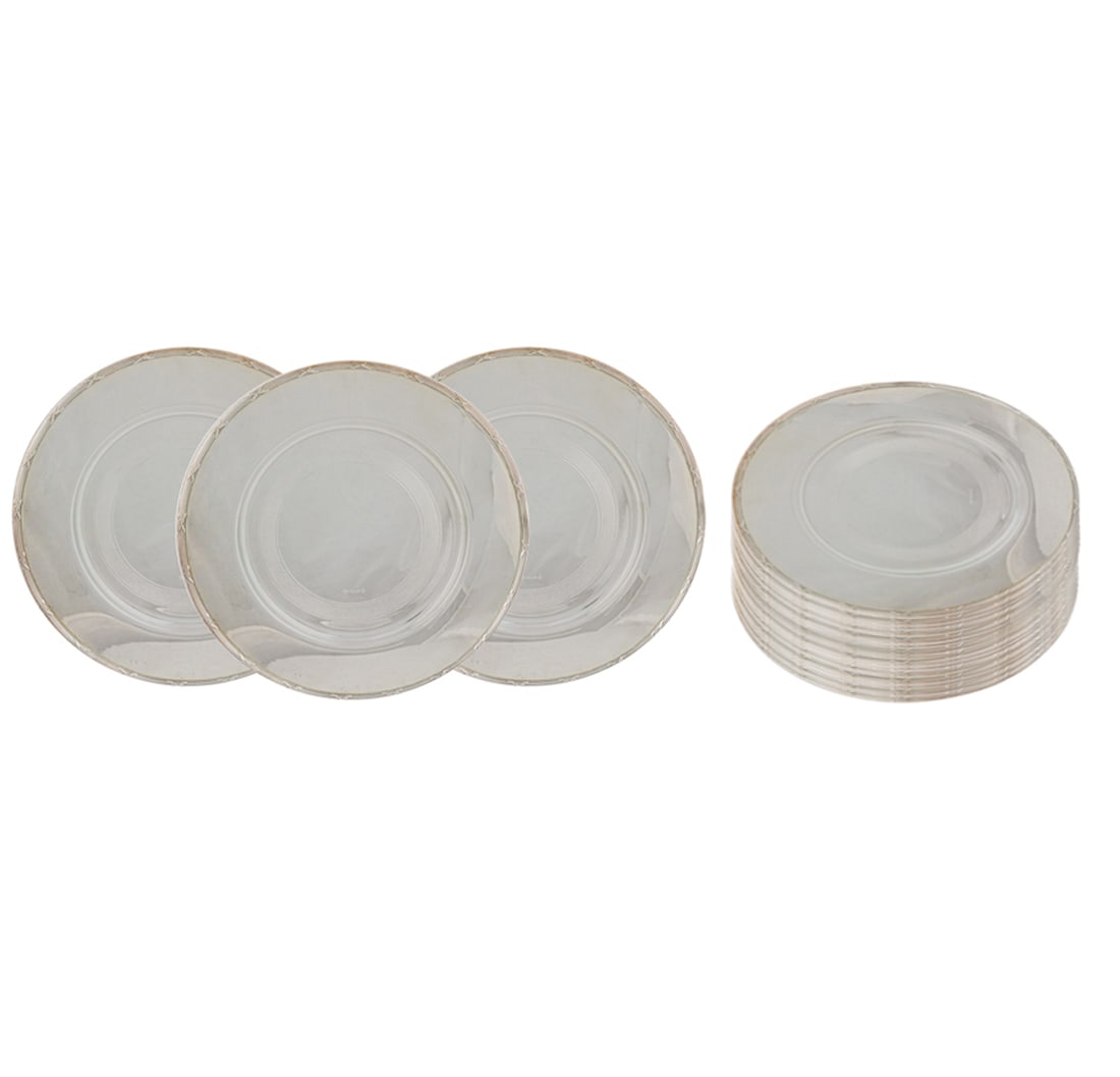 A boxed set of twelve Christofle plated chargers (1 of 2)