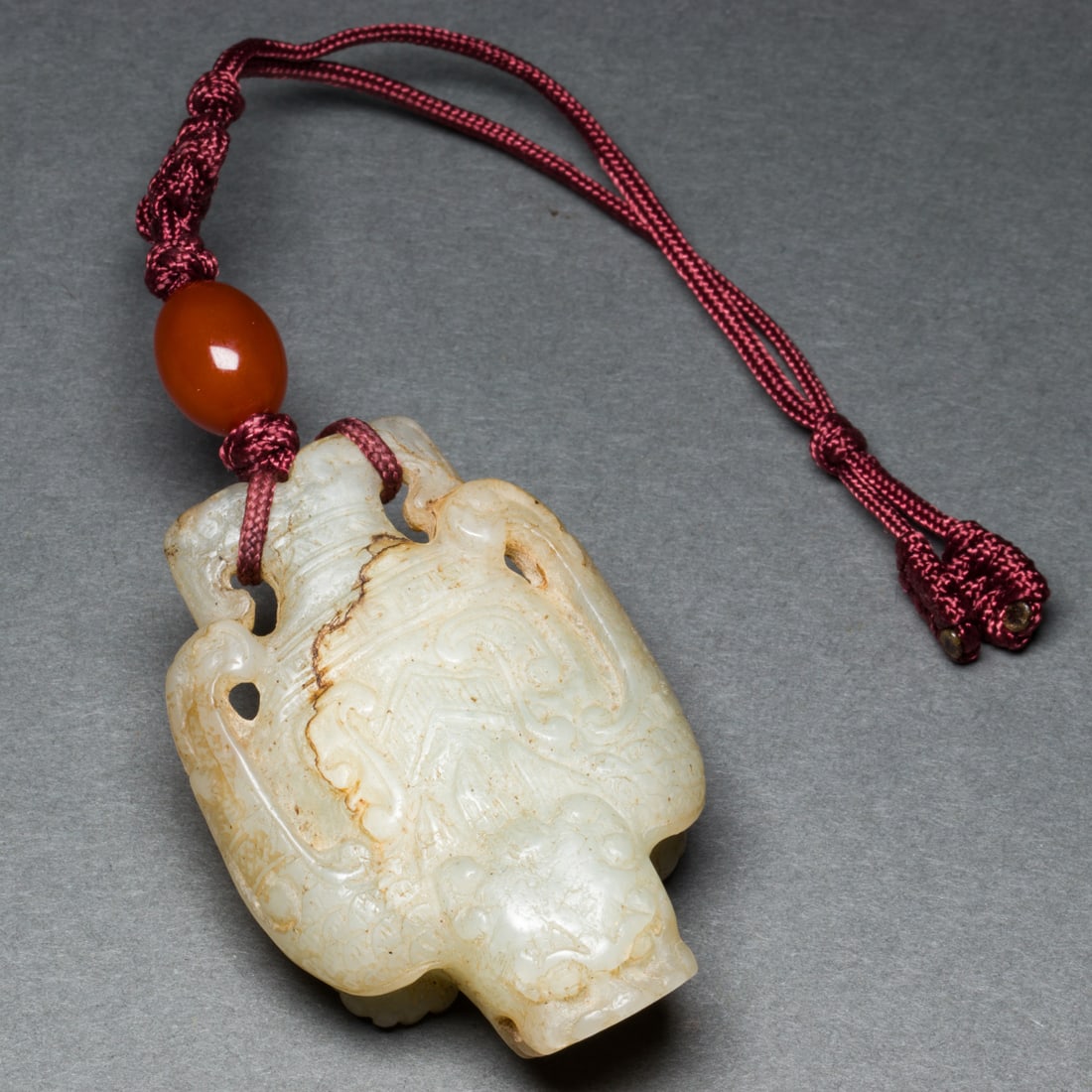 Chinese celadon jade 'mythical beast' toggle (1 of 2)