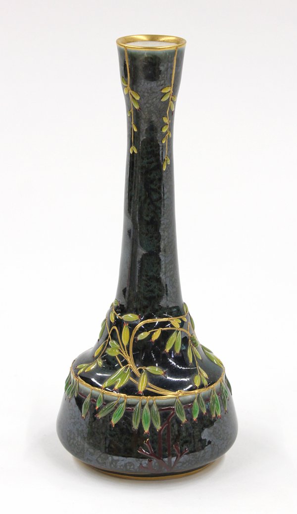 KPM enamel decorated vase: KPM enamel decorated vase, executed in the Art Nouveau taste, the slender tapering neck continuing to the bulbous waist accented with enamel decorated floral sprays having raised gilt accents on a mot