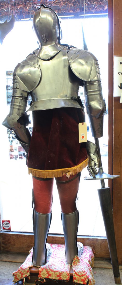 Italian suit of armor, 17th century style: Reproduction suit of armor, 17th century style, with an etched and engraved surface, comprising a close helmet with a two piece skull (armet), full arm defences, heavy breastplate with median ridge an