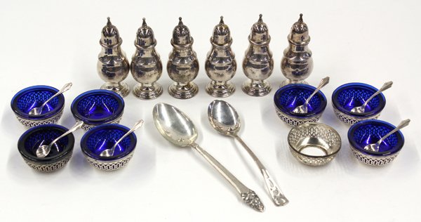 Sterling Silver Articles: Associated sterling silver articles consisting of eight reticulated salt stands having seven cobalt inserts, six salt spoons, six salt and pepper cellars, table spoon in the ''Sovereign'' pattern by G
