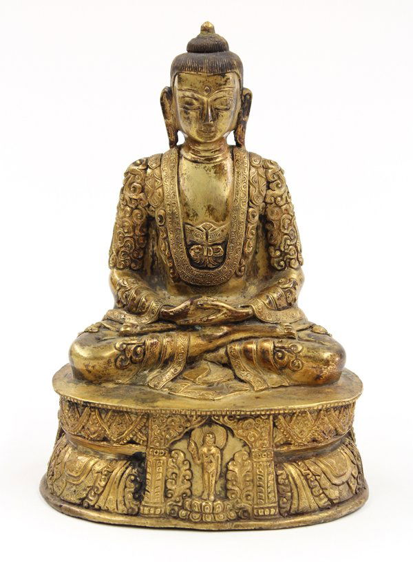 Chinese Gilt Bronze Buddha: Chinese gilt bronze figure of a Buddha, in deep contemplation seated in dyanasana and with dyana mudra, while adorned in ornate robes with floral tendrils in relief, all resting on a pedestal fronted