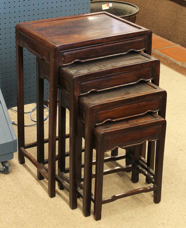 Chinese Wooden Nesting Tables: (lot of 4) Chinese hardwood nesting tables, each with a beaded shaped apron joined to slender supports with hoof terminals connected to humpback stretchers, largest: 27.5''h