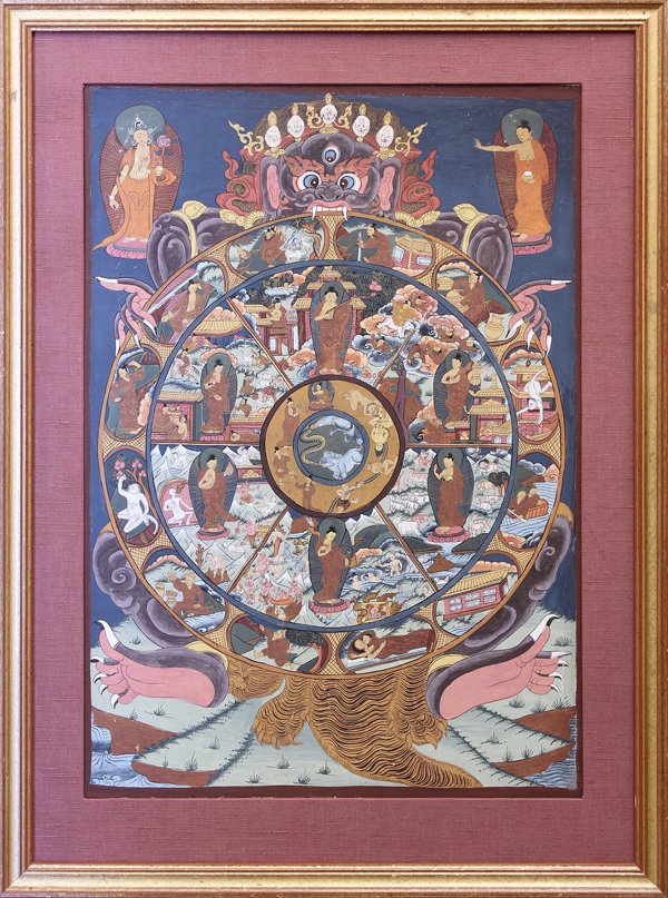 Himalayan Thangka, Wheel of the Law: Framed Himalayan thangka, depicting a mahakala clutching the 'Wheel of the Law' featuring scenes of various Buddhist figures, sight: 25.25''h x 17.5''w, overall: 32''h x 23.75''w