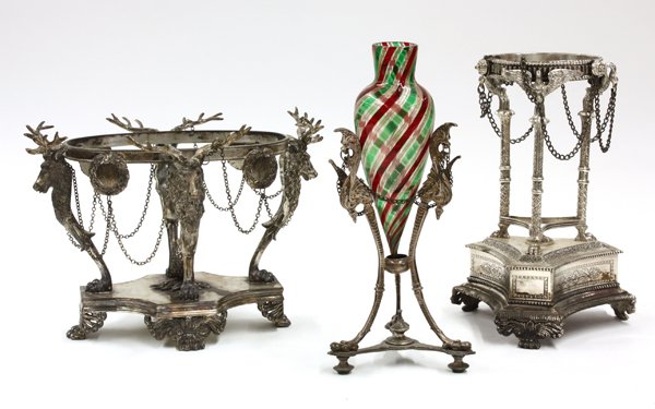 Renaissance Style Centerpiece Stands: (lot of 3) Renaissance Revival style silver plate consisting of two centerpieces showcasing chased moose and swans (lacking inserts), together with a centerpiece having glass vase insert with green, r