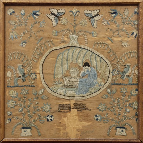 Framed Needlework Sampler: Framed needlework sampler circa 1820, flora and fauna decorated border accented with butterfly reserves surmounting the memorial medallion depicting a grieving woman under a willow tree, tomb reads ''