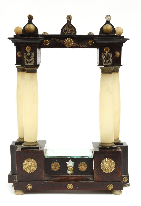 Renaissance Revival element: Renaissance Revival mantle element composed of carved mahogoany and white marble pillars, accented by arabesque finials and brass rosettes, 17''h