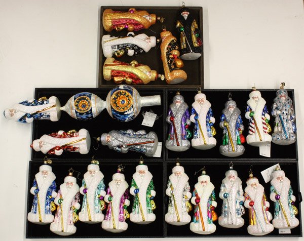 Radko Russian Santa ornaments: (lot of 23) Collection of Radko Russian Santa ornaments and tree topper