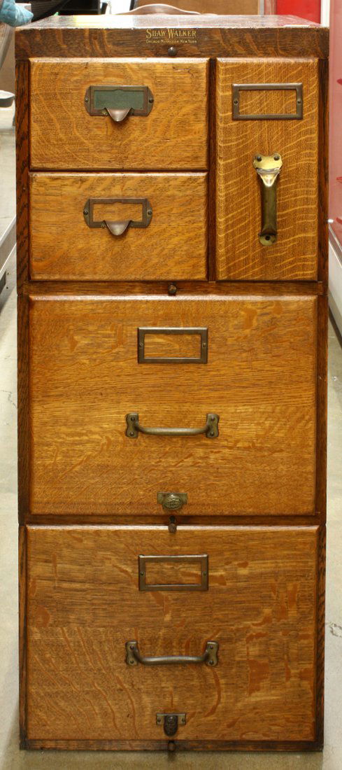 Shaw Walker oak file cabinet: Shaw Walker oak file cabinet, having five drawers including file, and refrence card drawers, 39.5''h x 16''w x 19''d