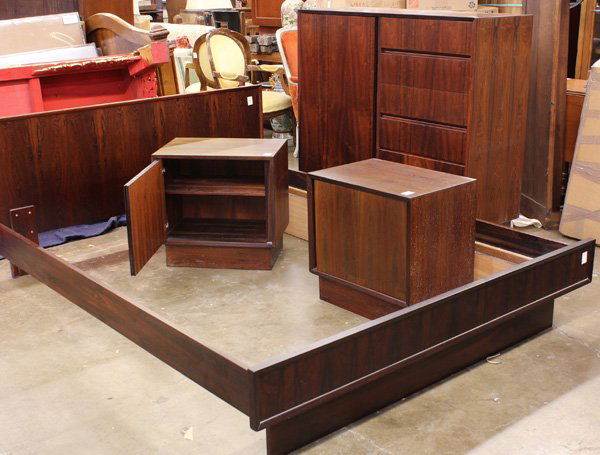 Danish Modern bedroom suite: (lot of 4) Danish Modern bedroom suite, consisting of a high chest 45''h x 47''w x 18''d, two bedside tables, 22''h x 22.5''w x 15''d, and a headboard, marked Made In Norway