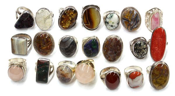 Lot of (21) white metal gem set rings: Lot of (21) white metal rings; (9) not stamped and (12) stamped ''925'' or ''sterling''; set with various gemstones including jasper, agate, azur-malachite, bloodstone, carnelian, howlite, psilomelane