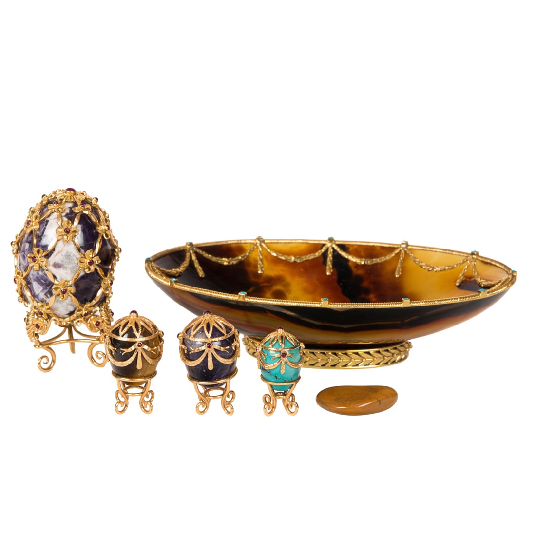 A Faberge style gilt metal agate bowl with a group of four stone eggs (1 of 3)