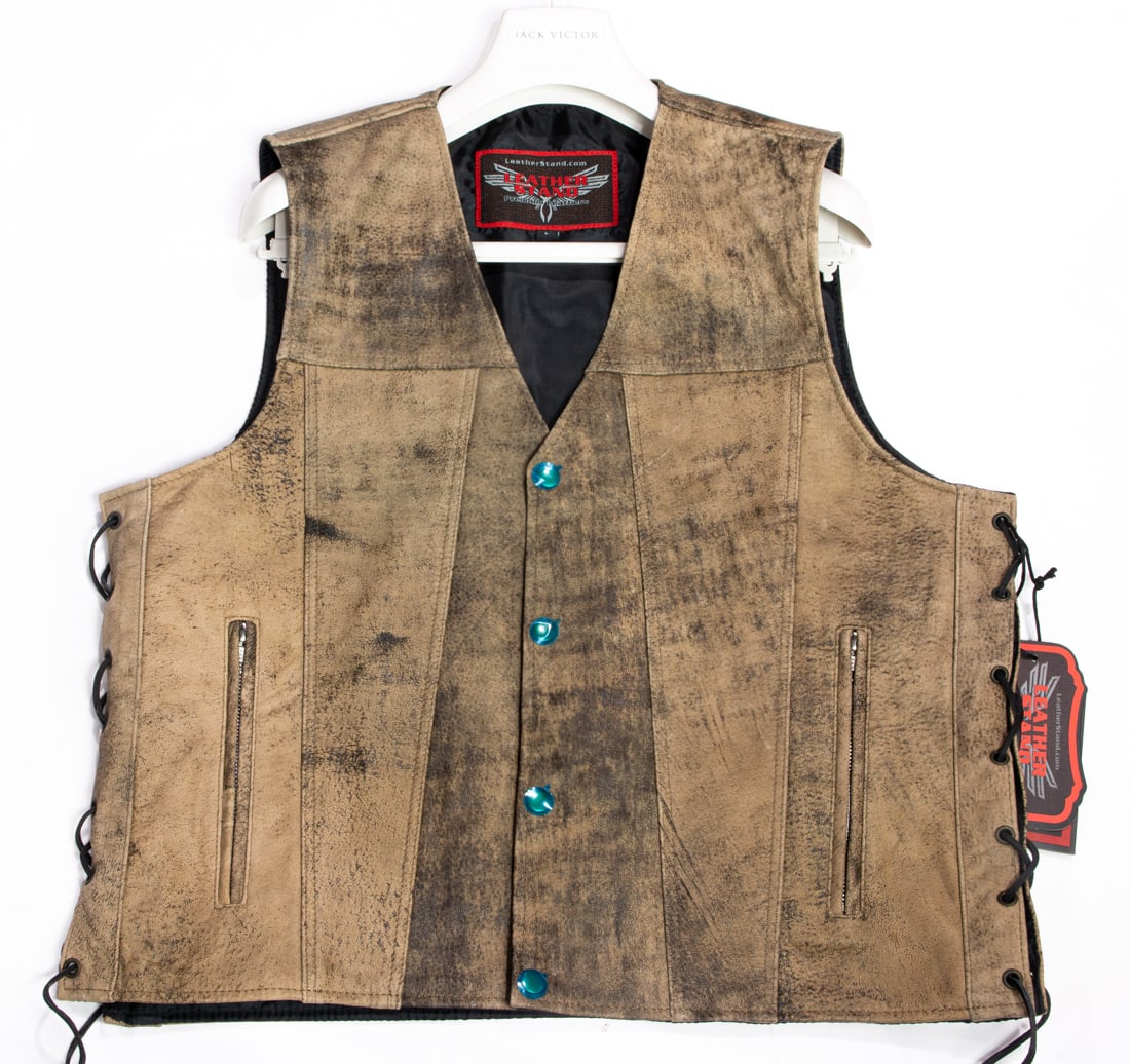 A men's leather gun vest: A men's leather gun vest, size large with original tags, together with a decorative oblong basket with woven orbs