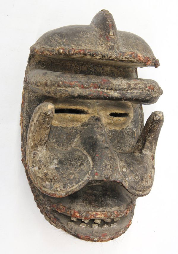 Bush Spirit Mask, We, aka, Guerre, Dan Complex: We, aka, Guerre, Dan Complex, Liberia, bush spirit mask, age uncertain, accoutrements include, rope, tacks, old nails, animal hide, ten metal teeth, back interior appears to have been oiled, 12.5''h x