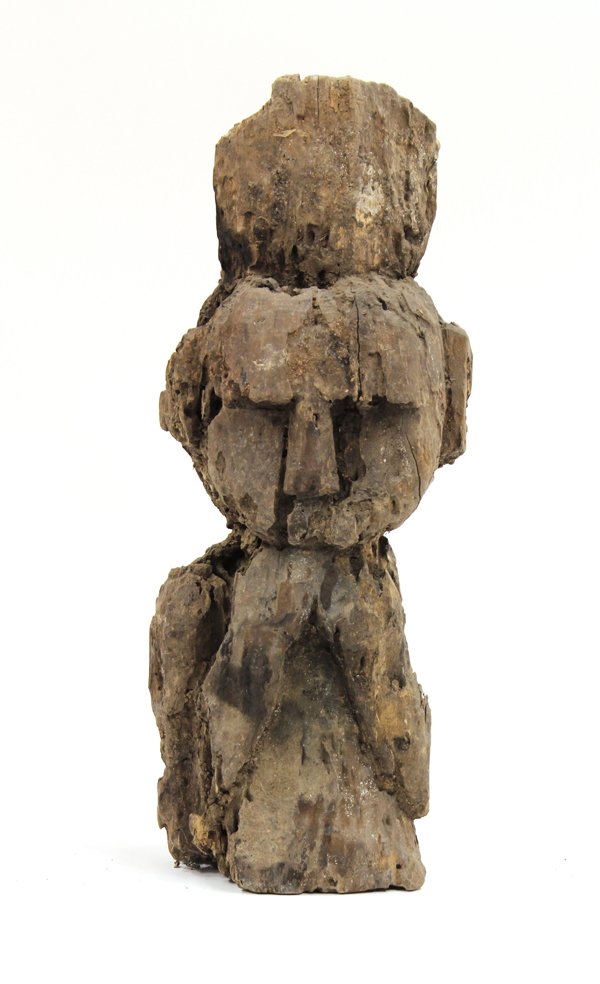 Nepal, Spring Figure Fragment: Nepal, spring figure fragment, having arms come up with hands tucked under chin, and heavy brow (eroded from apparent age), 18.5''h 6.5''w x 4''d. Provenance: The Hemphill Collection of San Francisco