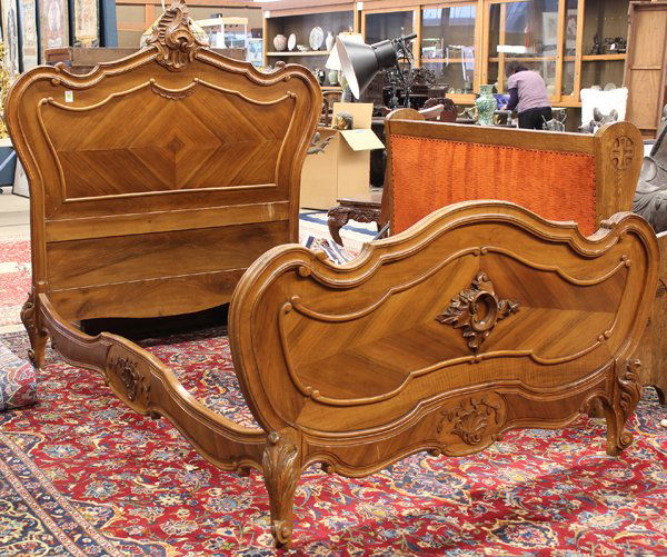 Louis XV style bed: Louis XV style walnut bed, having a carved crest centering the shaped headboard rising on cabriole legs accented with acanthus decorated knees, 62''h x 59''w x 80''l