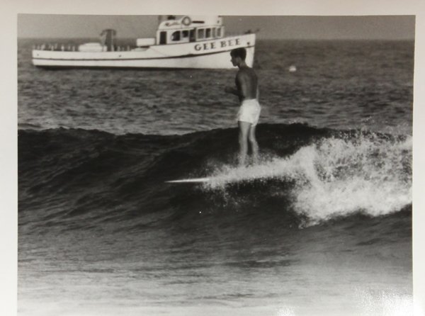 Set of 14 surfing photographs by LeRoy Grannis: (lot of 14) Unframed photographs, ''Surfing - Malibu (California),'' 1960, by LeRoy Grannis (Californian, 1917-2011), each stamped ''Aug 23, 1960'' verso, print (each): 4''h x 5''w. Provenance: Estate