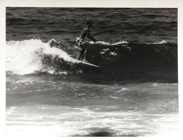 Set of 18 surfing photographs by LeRoy Grannis: (lot of 18) Unframed photographs, ''Surfing - 22nd Street, Huntington Beach (California),'' 1960, by LeRoy Grannis (Californian, 1917-2011), including one featuring Drew Young, each dated in pencil ''