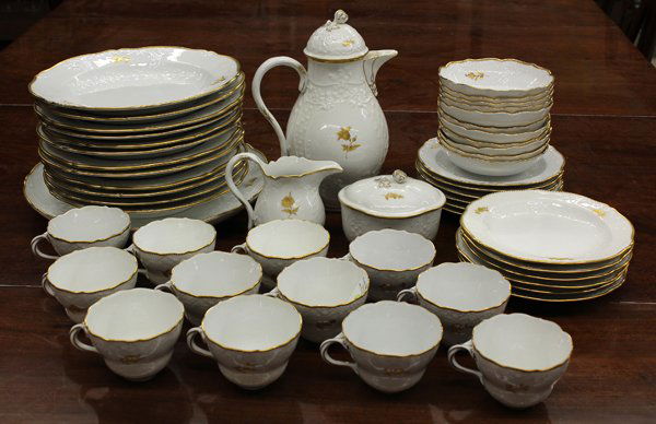 Meissen Table Service: (lot of 40) Meissen table service for twelve executed in the swan pattern, having partial gilt accents surrounded with floral accents on a white ground each having blue underglazed cross sword mark wi