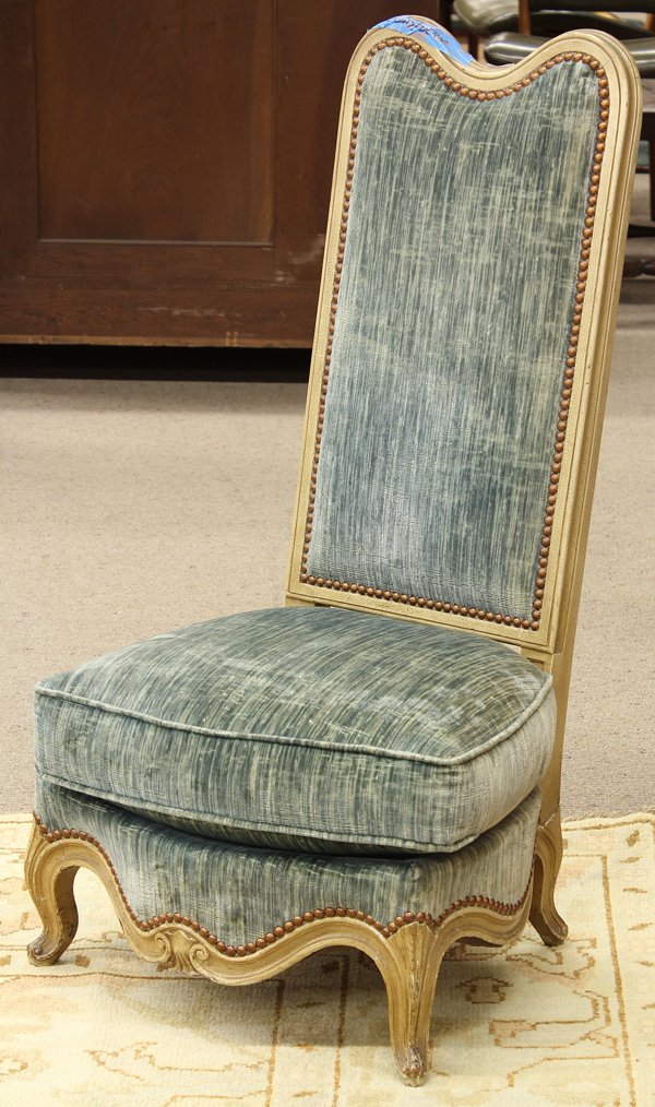 Italian slipper chair: Italian Rococo style slipper chair circa 1900, the paint decorated frame having a reverse serpentine crest and rising on cabriole legs, 37''h x 20''w