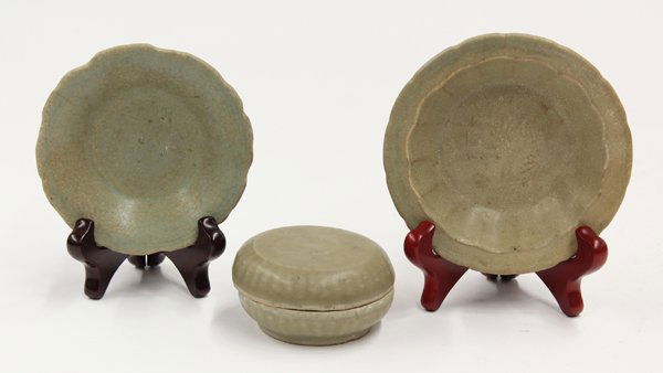 Chinese Celadon Dishes and Box, Ming Dynasty: (Lot of 3) Chinese celadon glazed ceramic dishes and box, Ming dynasty, the first a small circular Longquan box, molded with a large blossom to the lid; the second a shallow dish with a foliate edge a