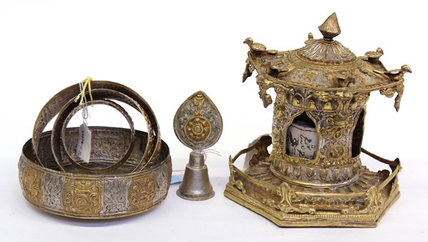 Himalayan Votive Pieces: (lot of 6) group of Himalayan silver gilt metal votive pieces, 20th century, consisting of a table top prayer wheel, a bowl, three rings, and a finial, 7.5''h; Provenance: The Hemphill Collection of S