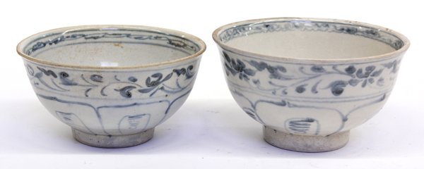 Vietnamese Blue-and-White Bowls, Hoi-an Hoard: (Lot of 2) Vietnamese underglaze blue bowls, each of inverted bell form decorated with a band of tendrils above a lotus petal pattern encircling the lower exterior, the interior centered with a floral