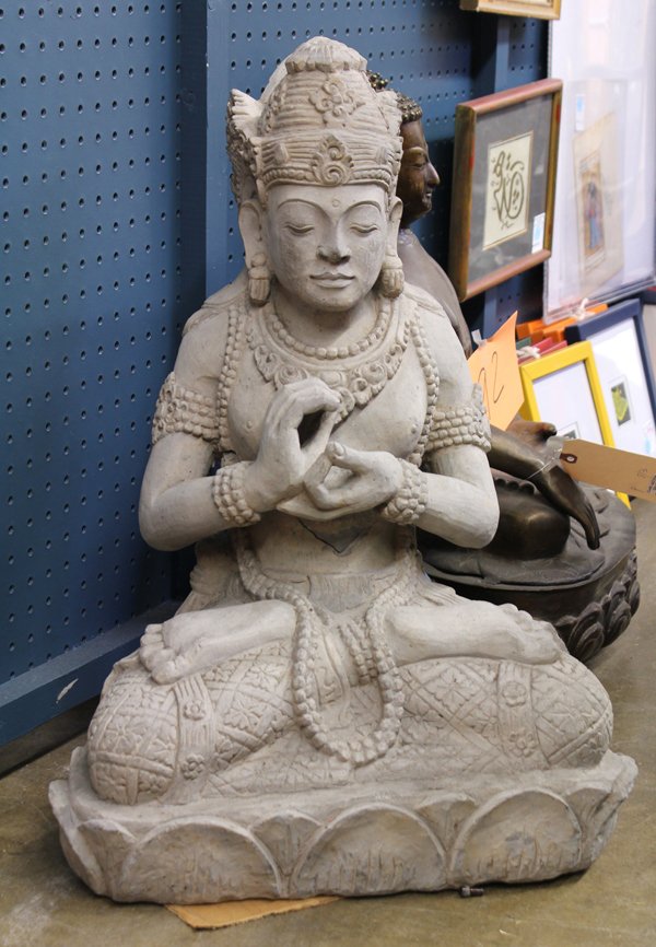 Balinese Figural Sculpture: Indonesian/Balinese cast cement sculpture, the defined face topped with an elaborate headdress, adorned with jewels and princely raiments with hands in dharmachakra (repaired), 24''h