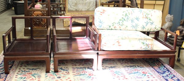 Chinese Living Room Suite: (lot of 4) Chinese wooden living room suite, consisting of a settee, loveseat and two chairs, each with a bead edge top rail and arms, above a plain beaded apron raised on supports with hoof terminals