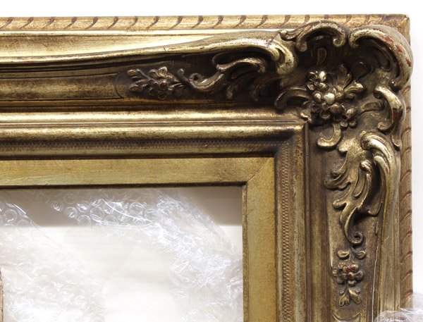 Antique frame group: (Lot of 3) Continental frame group consisting of one giltwood and gesso carved frame executed in the Rococo taste 49''h x 41''w interior 39.5''h x 30.5''w, together with two graduated wood picture fra