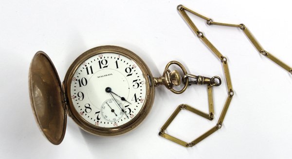 Gold-filled ''Waltham'' hunter case pocket watch: Gent's ''Waltham'' hunter case pocket watch; mounted in gold-filled metal with a 23-jewel vangaard movement #19076654, model #30977, case #7630977. The 41.00 mm. white porcelain dial with sunken secon