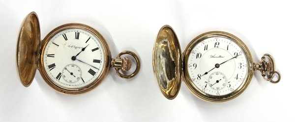 (lot of 2) Gold-filled hunter case pocket watches: (Lot of 2) Hunting case pocket watches; both mounted in gold-filled metal, one is movement #869028 stamped ''Hamilton Watch Co., Lancaster, PA'', case #1698477. The 40.00 mm. white porcelain dial (cra