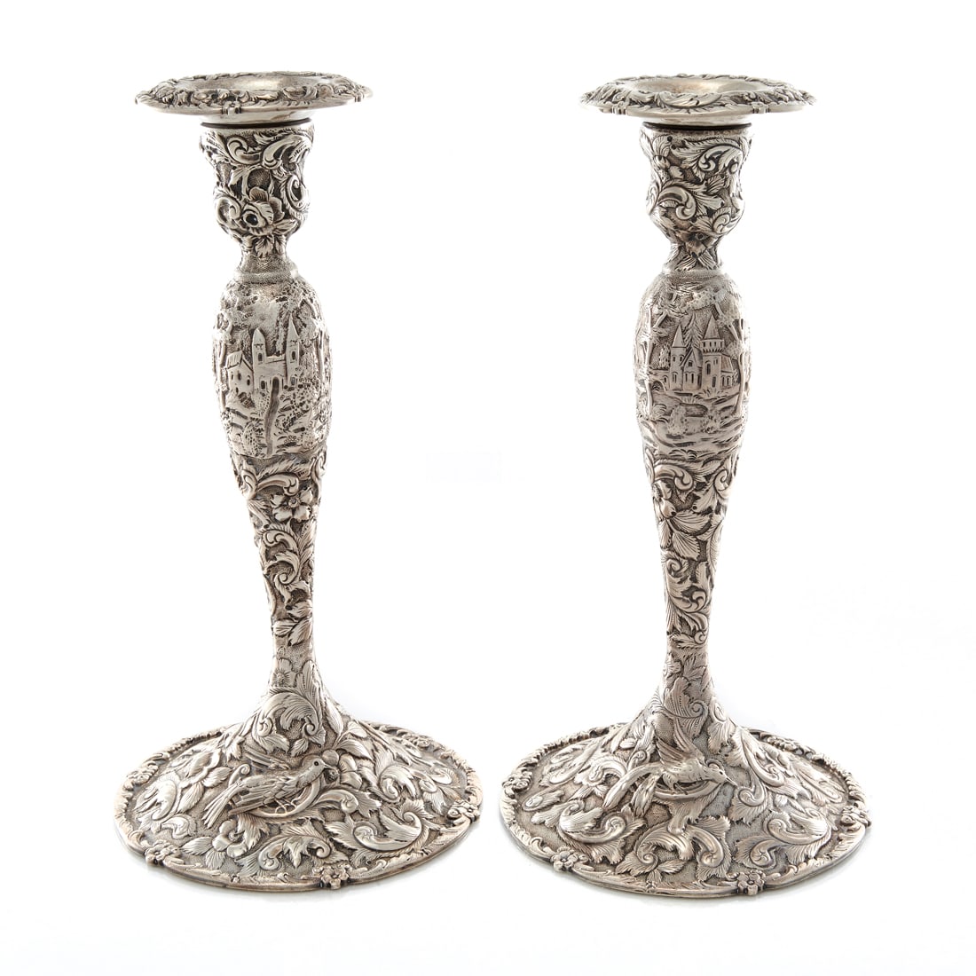 A pair American Loring Andrews Co. sterling repousse candlesticks (1 of 2)
