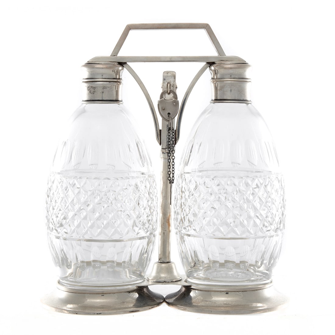 An English silver mounted safe with pair of cut glass decanters probably by Hawkes (1 of 2)