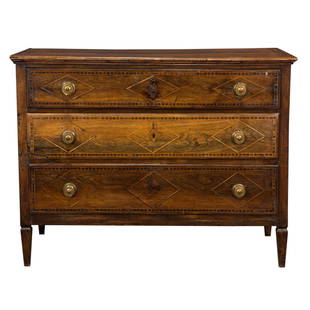 A Continental Neoclassical fruitwood commode: A Continental Neoclassical fruitwood commode, the outset top inlaid with an inner banded border, over three long drawers, the drawer friezes inlaid with diamond surrounds to knob drawer pulls and the