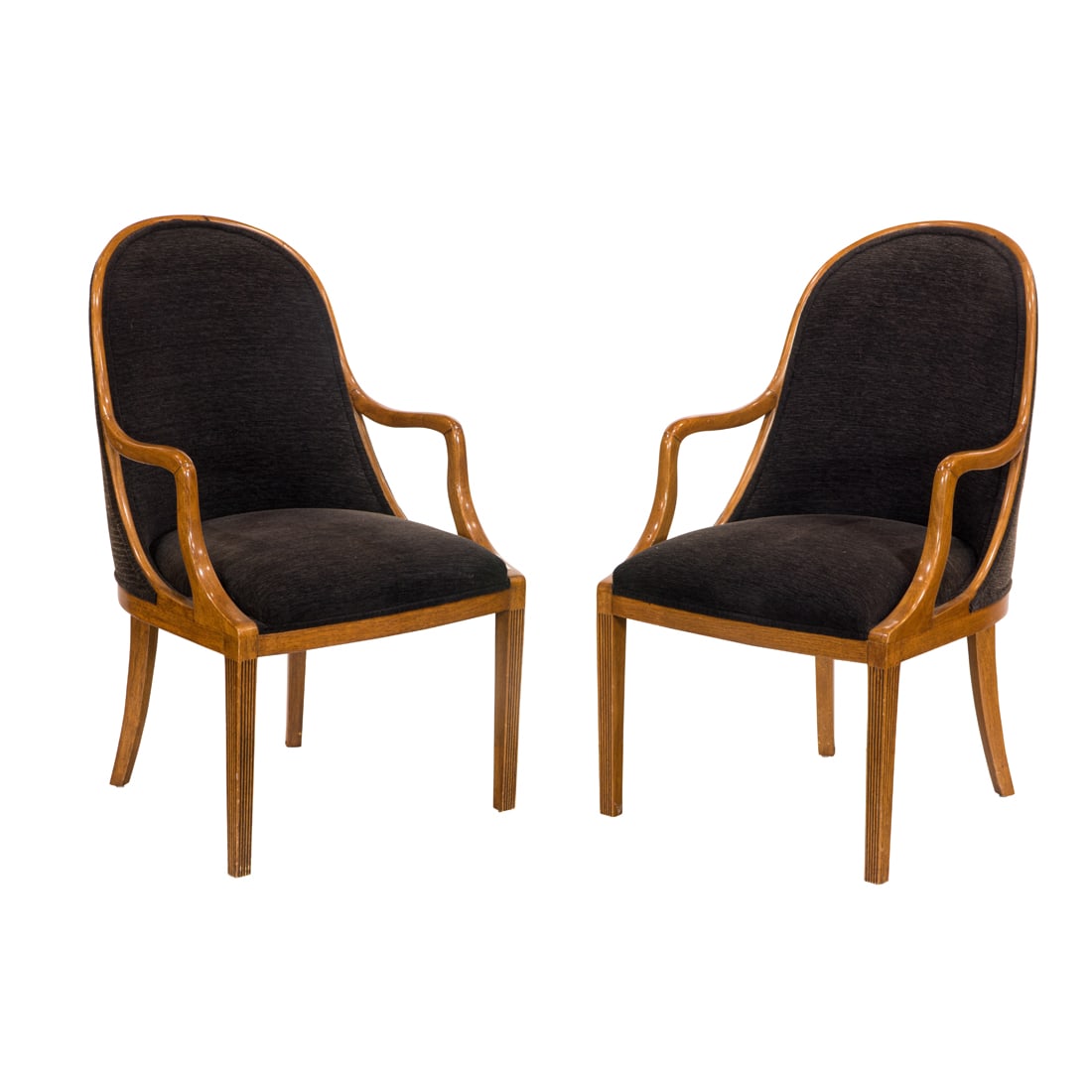 A pair of Dessin Fournir Plante gondola chairs: A pair of Dessin Fournir Plante gondola chairs, each with stylized arms continuing to the contoured back and rising on tapered, fluted legs, retains Fournir label to underside, 38.5"h x 23"w x 20"d