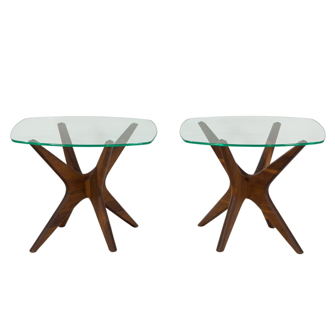 A pair of Adrian Pearsall Craft Associates 'Jax' sculpted walnut tables with glass tops (1 of 3)
