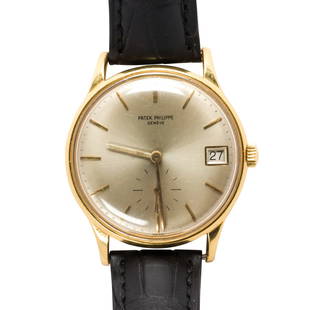 A Patek Philippe 18k gold Calatrava wristwatch: A Patek Philippe 18k gold Calatrava wristwatchRef. 3514, circa 1960's, case no. 317'565the automatic watch, yellow tone dial with applied hour indices, pearled minute track, pencil hands, date apertur