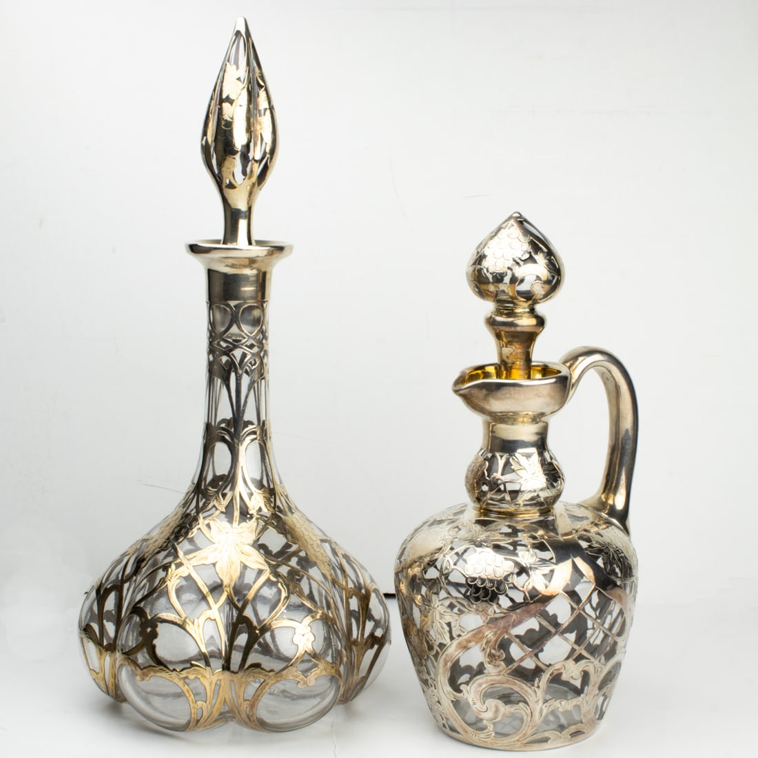 Two Art Nouveau silver overlay glass bottles with grape vine decoration (1 of 1)