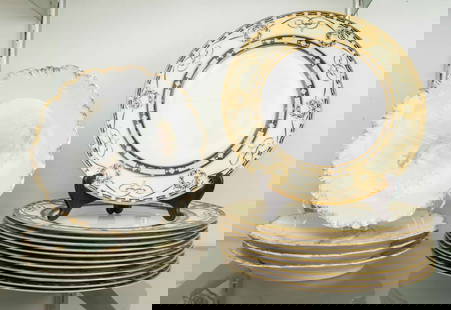 A set of twelve Royal Worcester porcelain dinner plates retailed by Tiffany & Co. New York in: A set of twelve Royal Worcester porcelain dinner plates retailed by Tiffany & Co. New York in pattern 2325, 10.5"dia, together with (4) Limoges fish plates, 9"dia