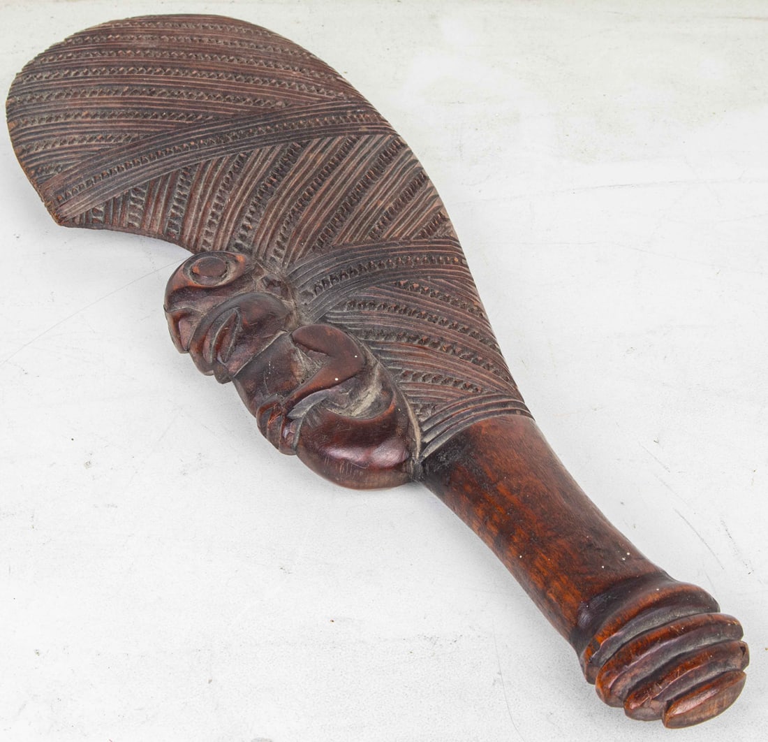 A Maori club (Patu) carved as a monkey 14"h: A Maori club (Patu) carved as a monkey 14"h