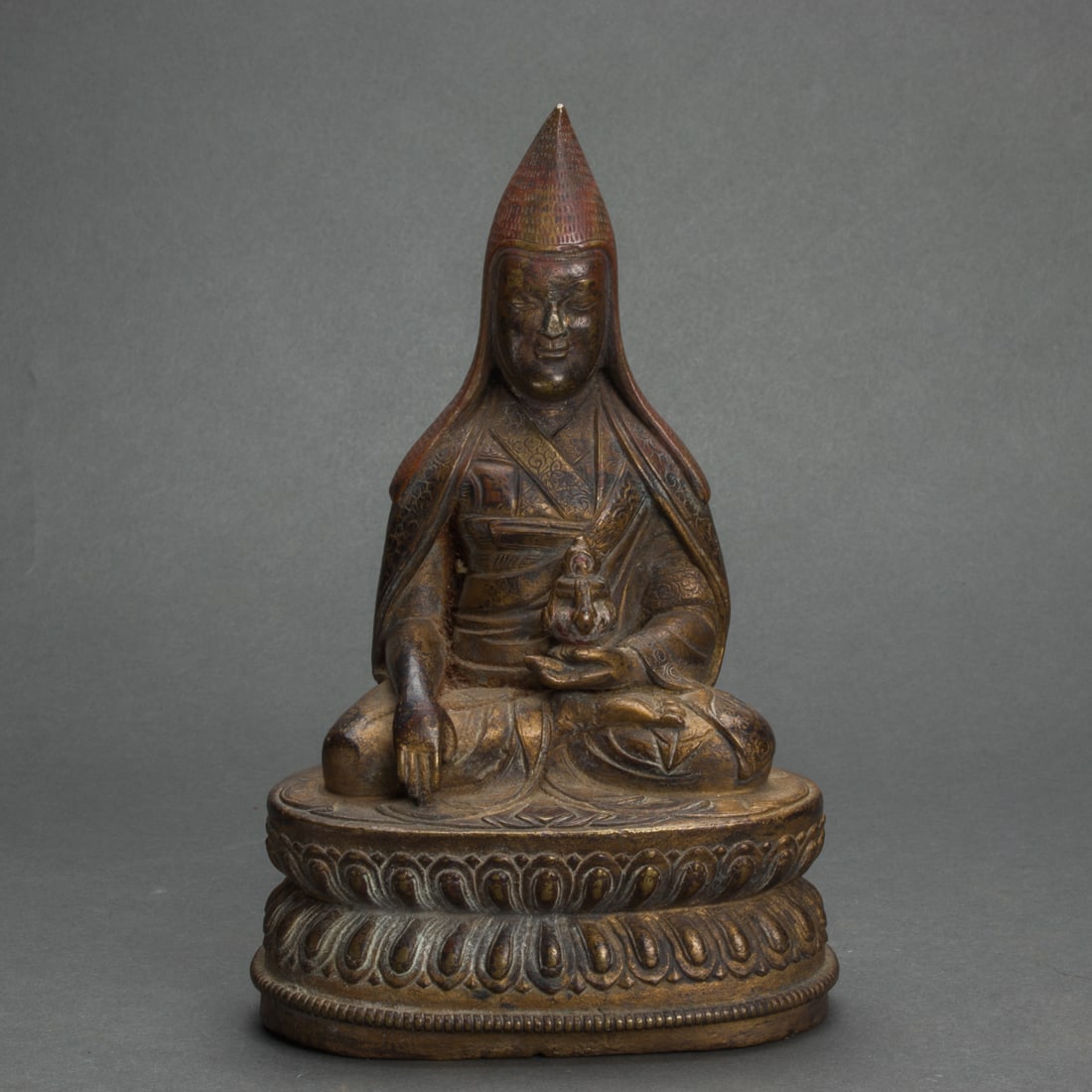Tibetan gilt bronze figure of a lama: Tibetan gilt bronze figure of a lama. Qing dynasty, 6.5" high.