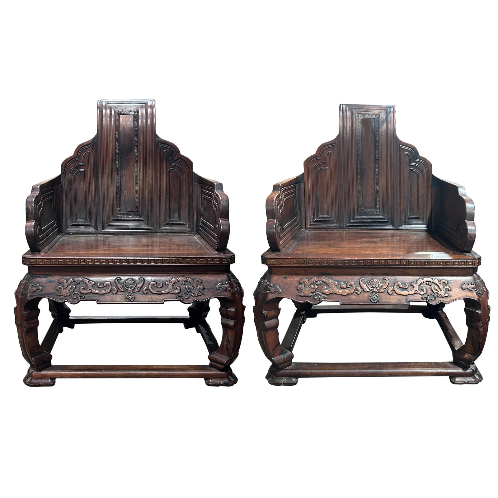 Pair of Chinese hardwood arm chairs: Pair of Chinese hardwood arm chairs. Carved with stylized dragons and bats, Republic period, 38'h x 26.75"w x 20.5".