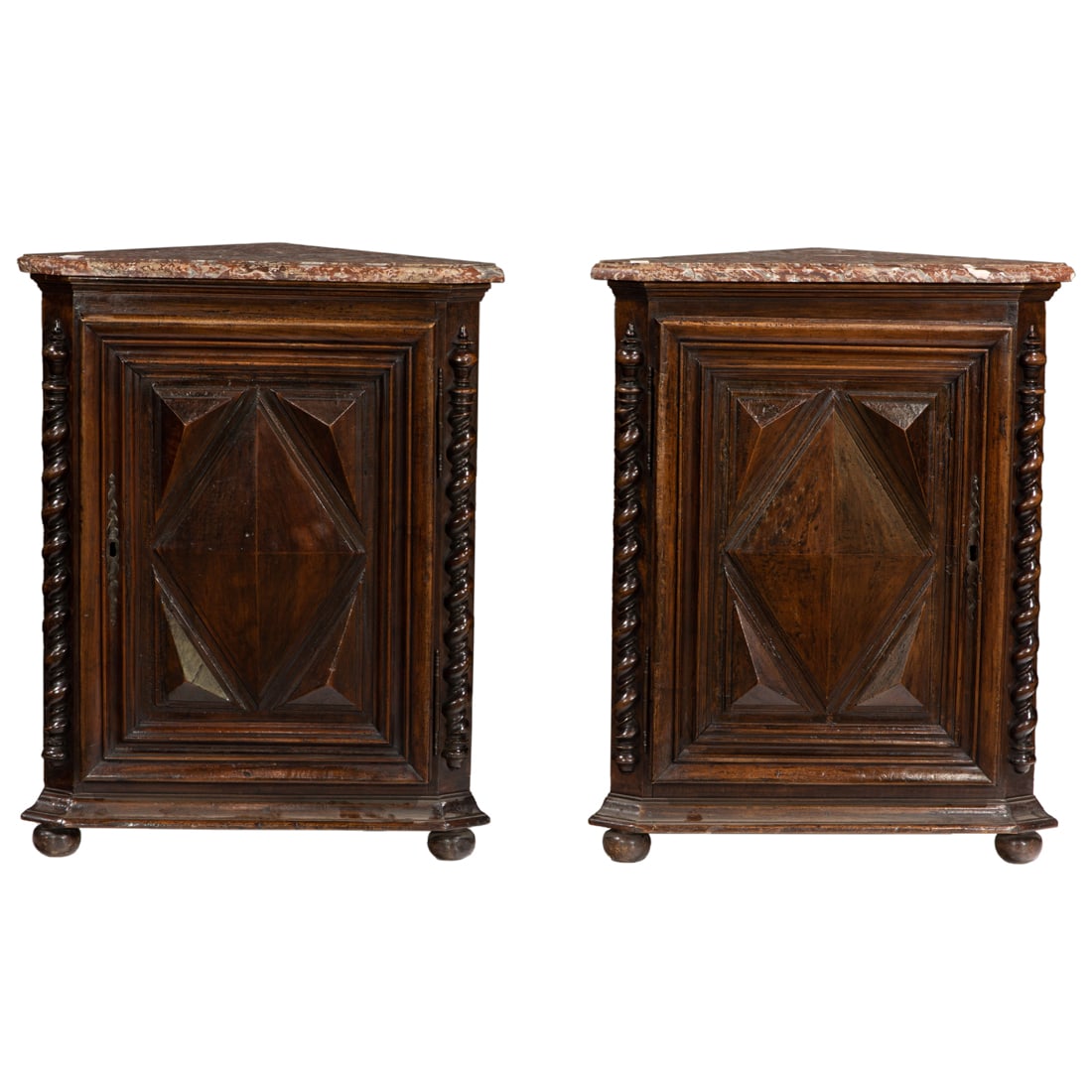 A pair of Italian Baroque style walnut corner cupboards, possibly 17th century (1 of 3)