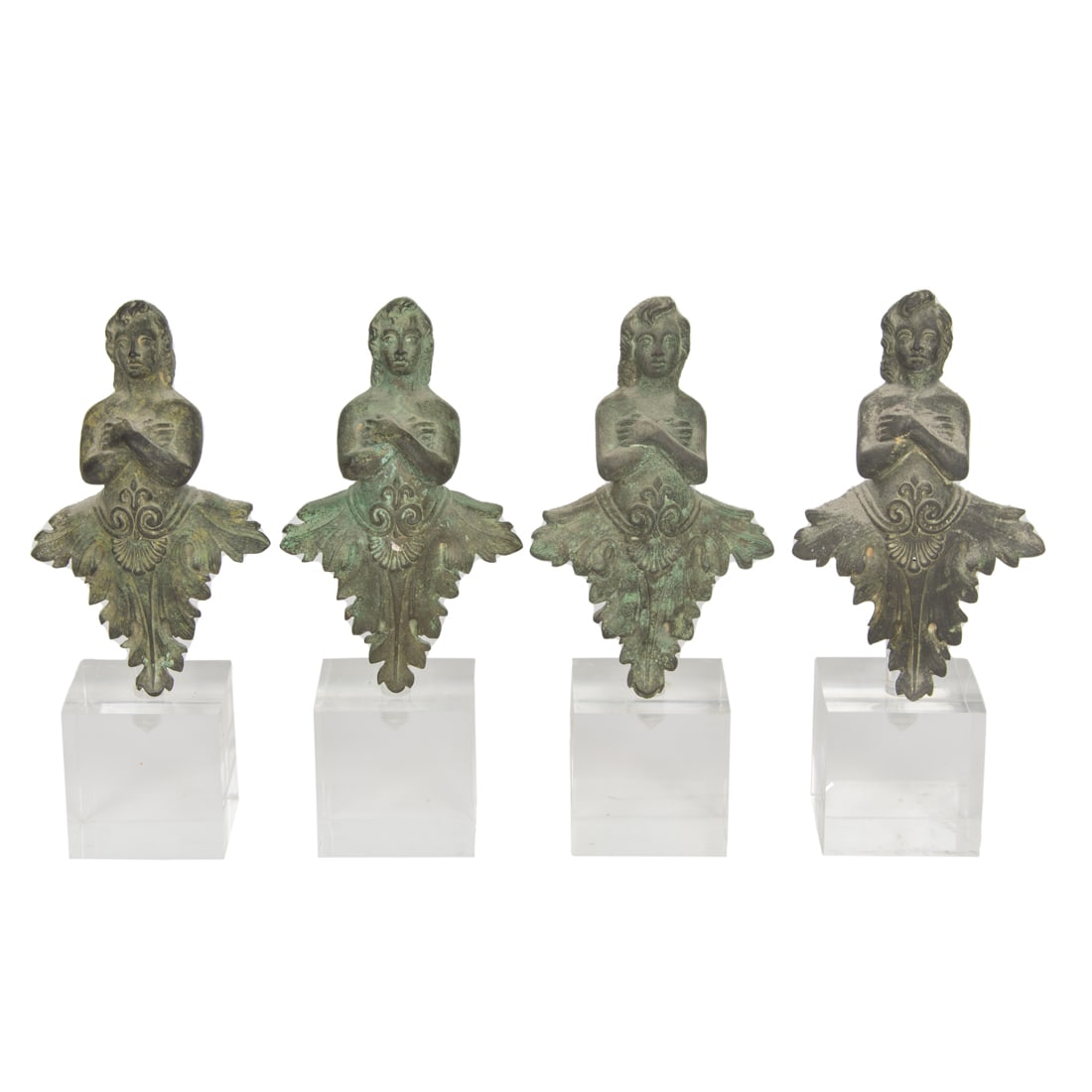 A set of four Roman bronze figural mounts (1 of 3)